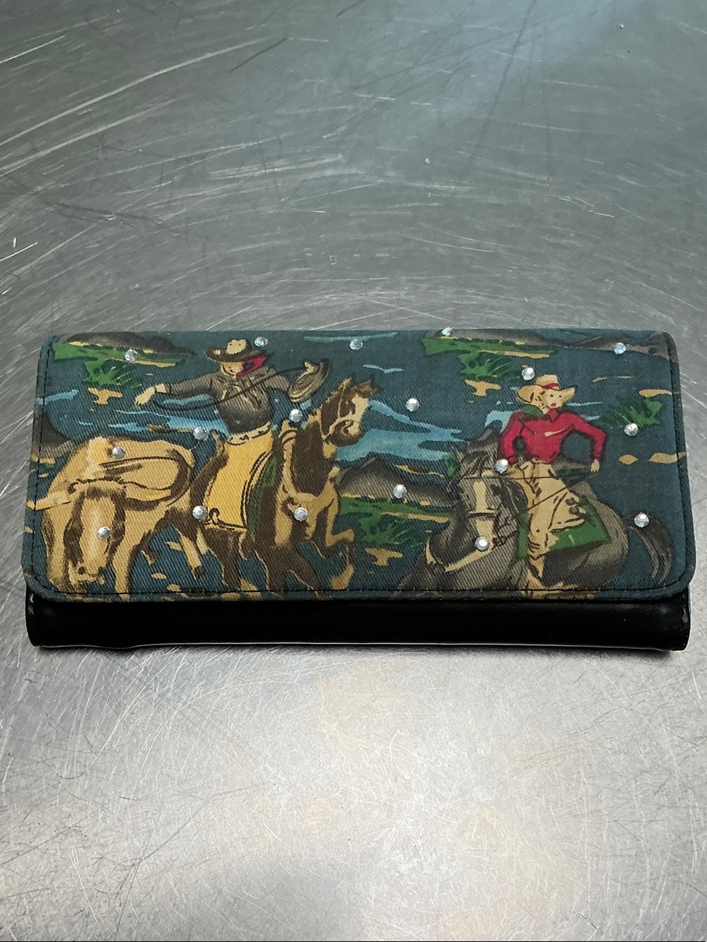 Cowboy wallet, never used. Removable checkbook/ card holder.